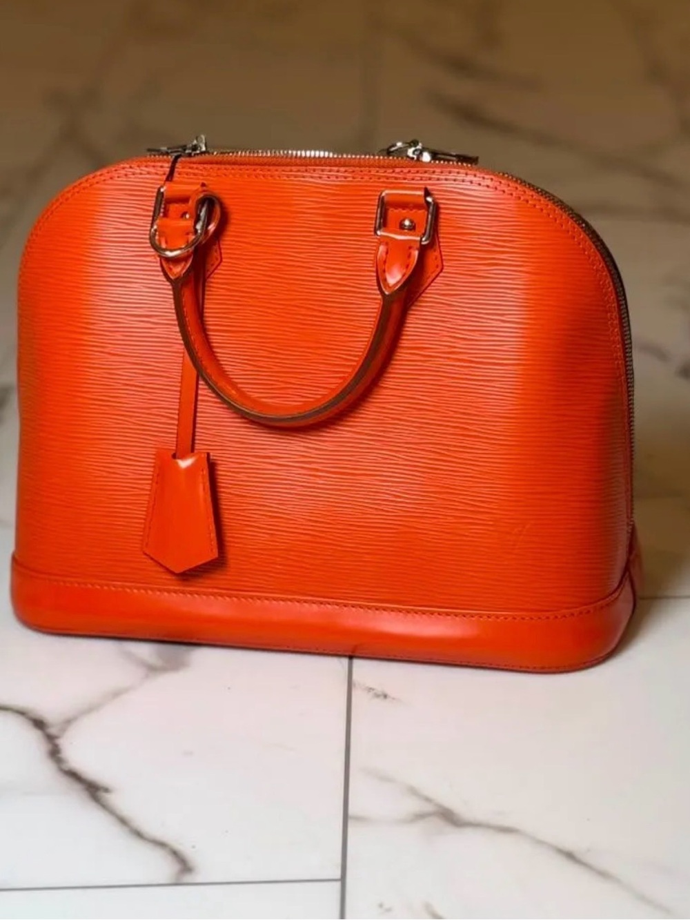 Louis Vuitton Piment Alma PM Leather Handbag